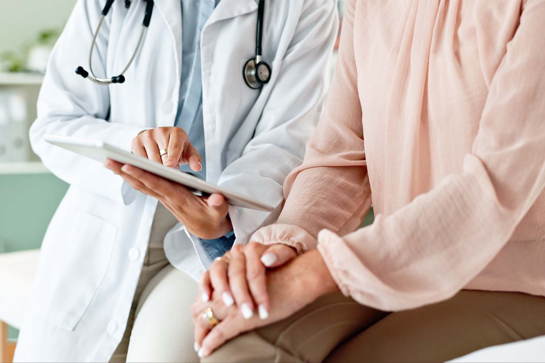 dr-sitting-with-patient